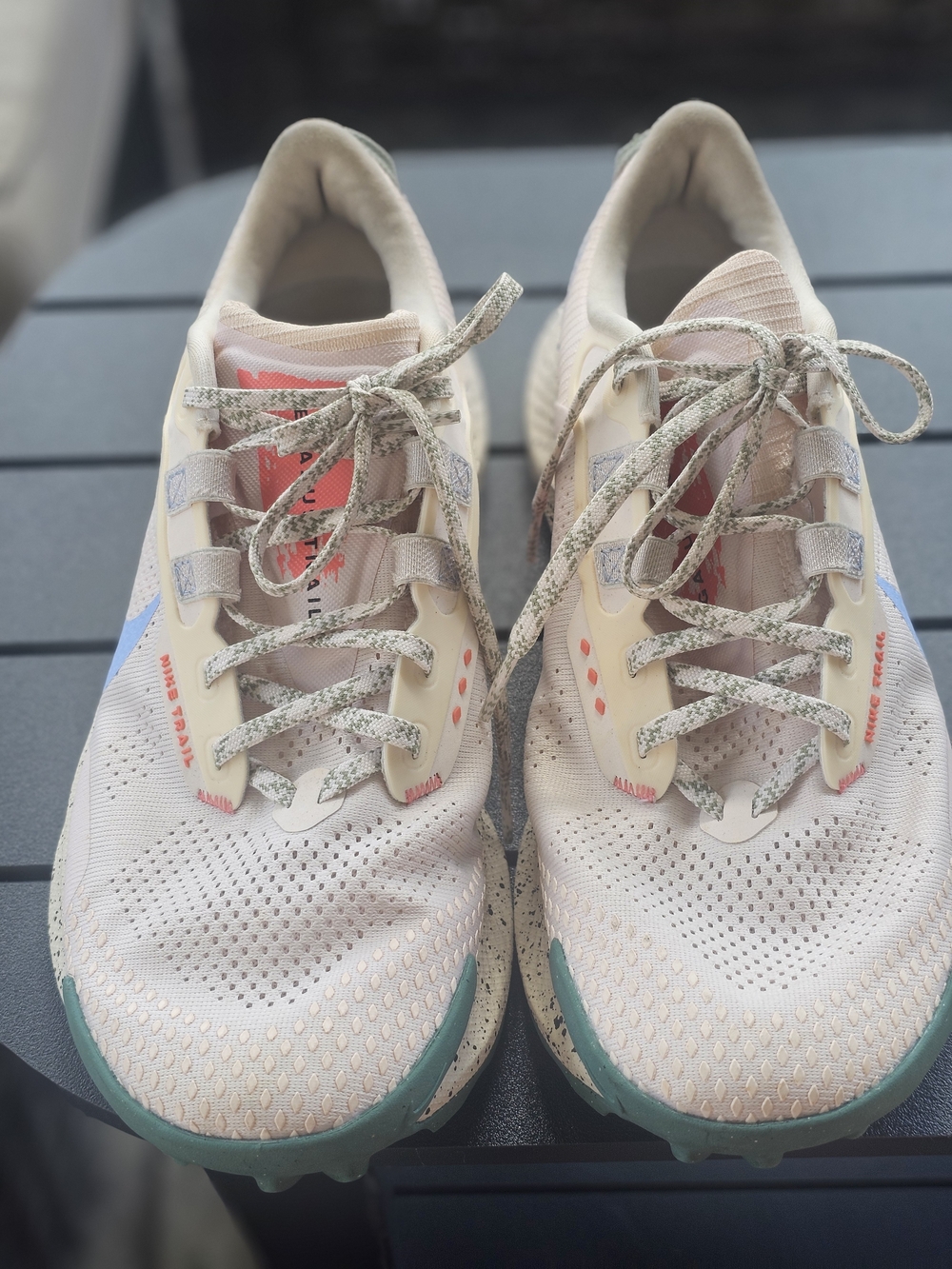 Nike sneakers in soft pink and white